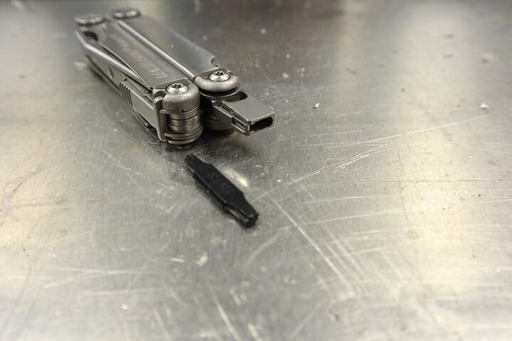 The flattened Leatherman screw bit drive socket and a flat Leatherman screw bit