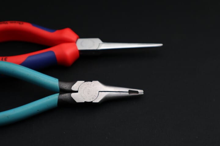 Needle nose pliers with cutting jaws near the tip